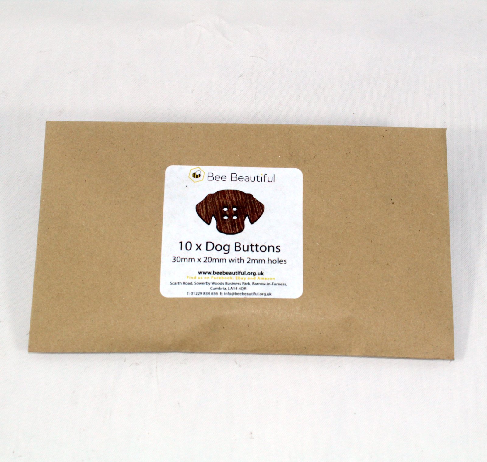 dog head buttons in packaging