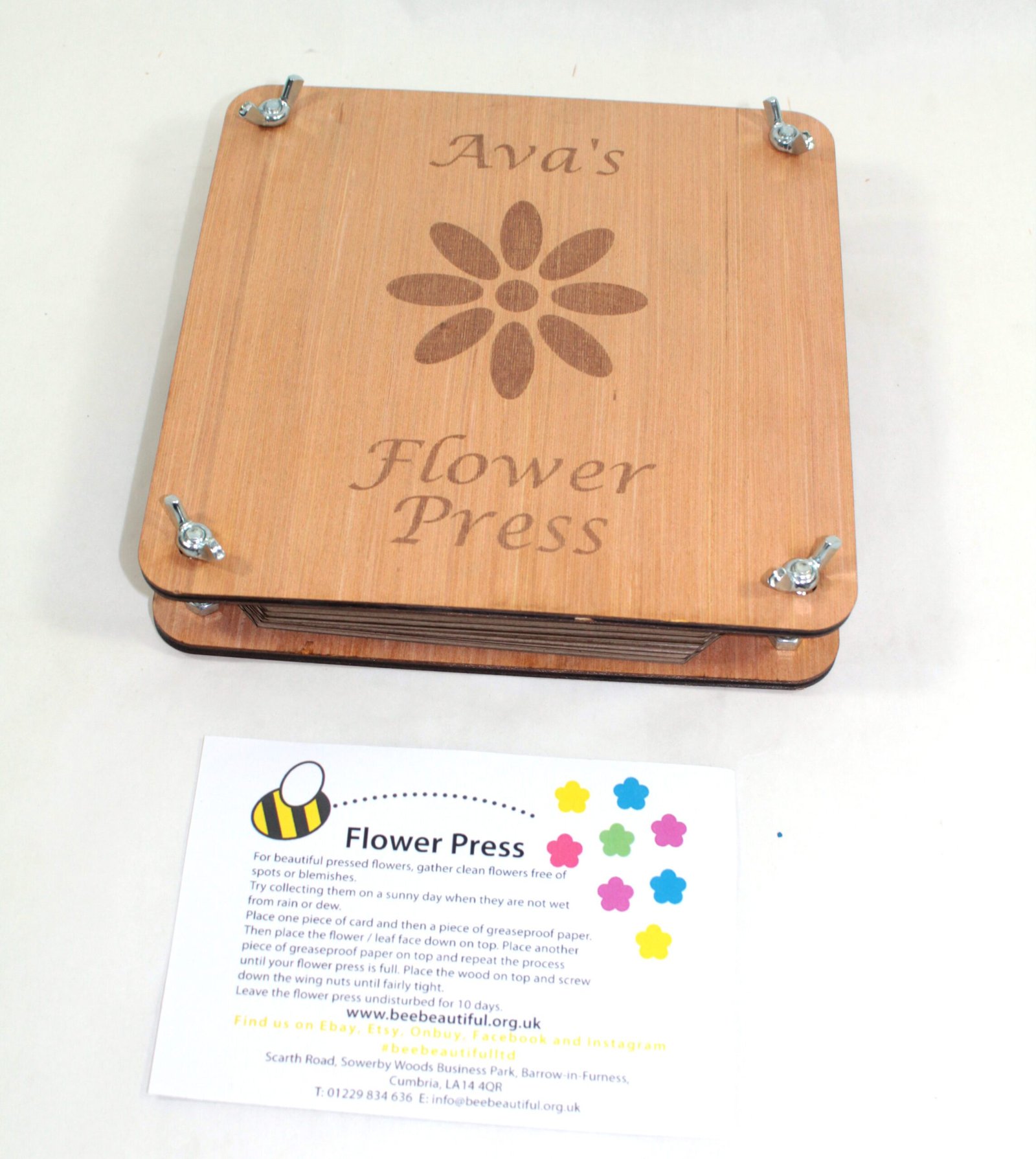 front of flower press with leaflet