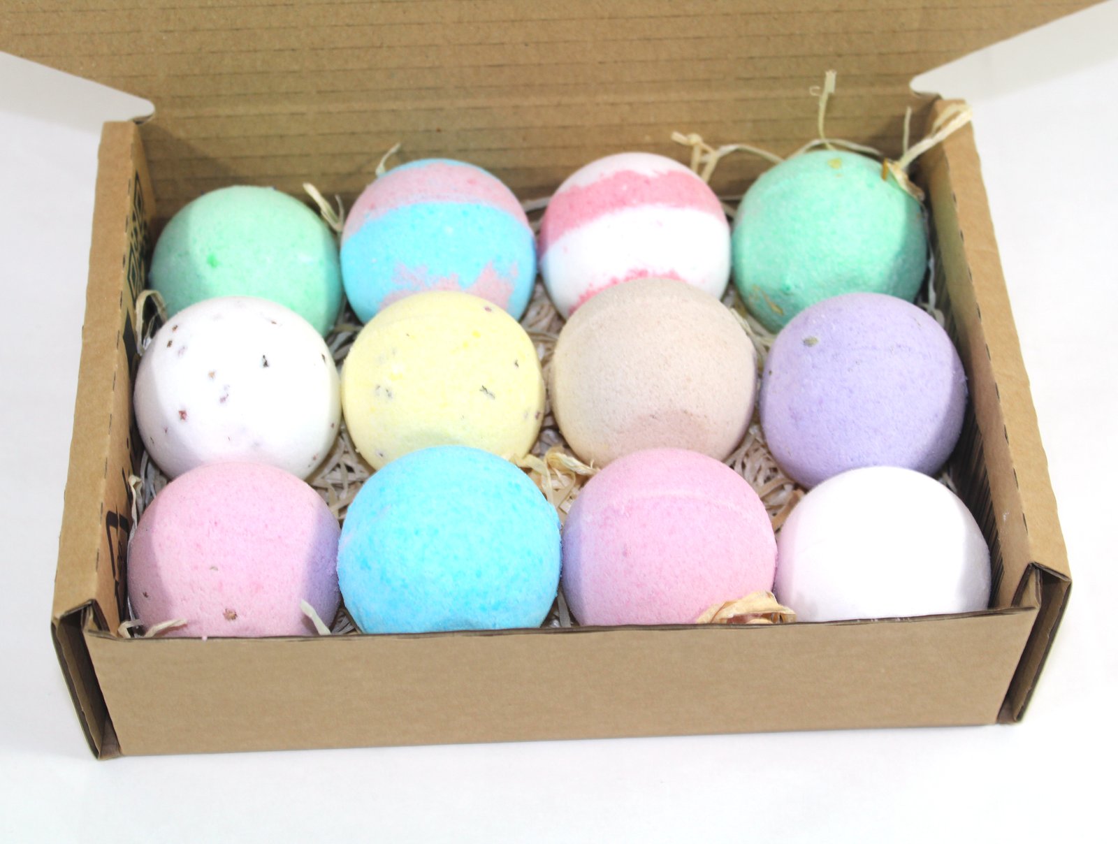 close of up of mix of bath bombs in box